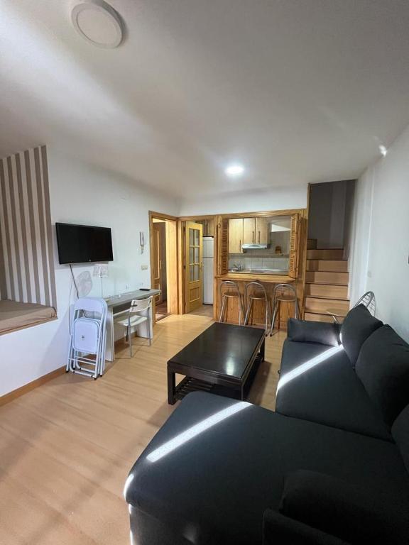 A television and/or entertainment centre at BUENAVISTA DELUXE