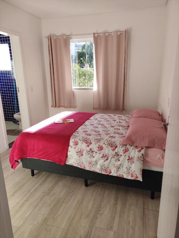 Postel nebo postele na pokoji v ubytování Quarto Privado com Suíte - Oktoberfest 10min