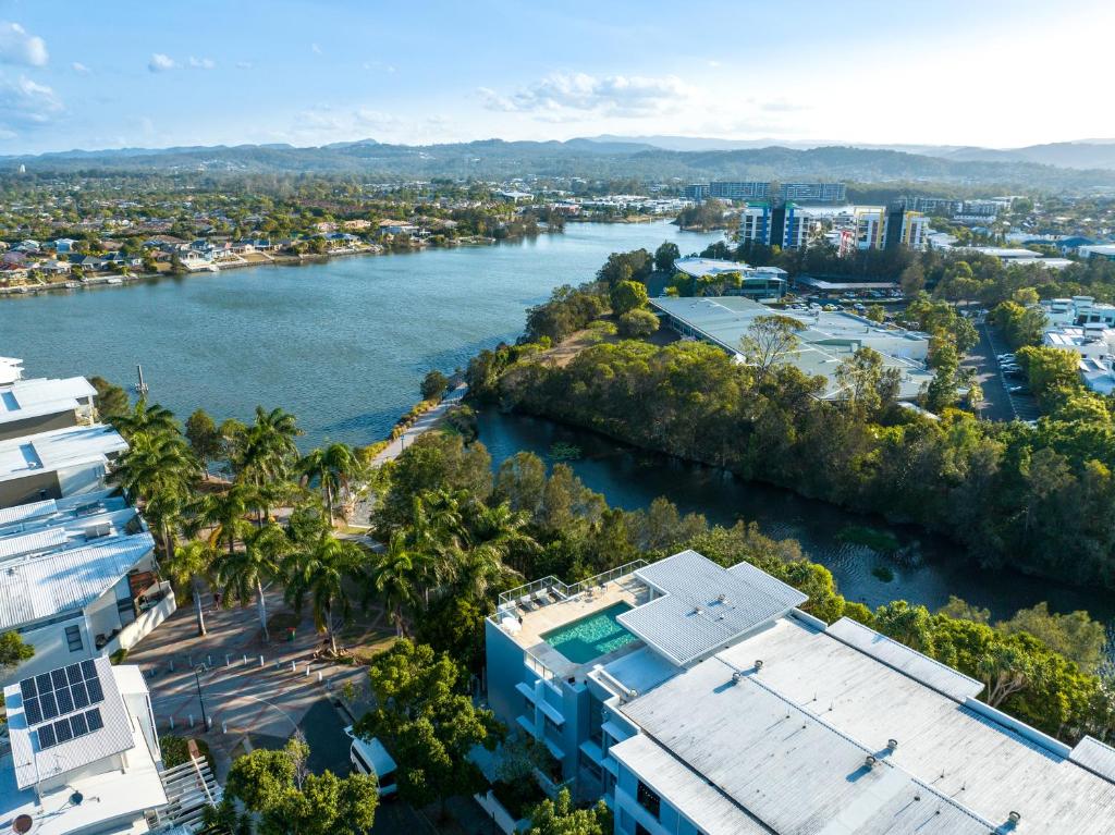 an aerial view of a river with buildings at Luxury Stays Varsity-Robina-Bond in Gold Coast