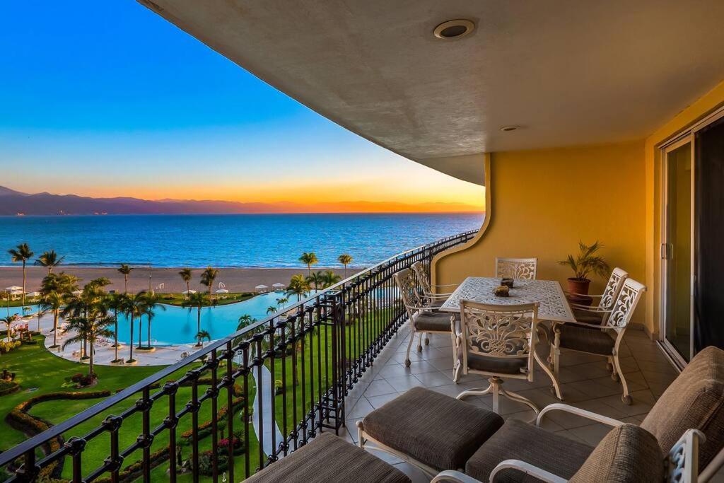 a balcony with a view of the ocean at Beach Front-Ocean Views-Marina Luxury Condo-BVG in Puerto Vallarta
