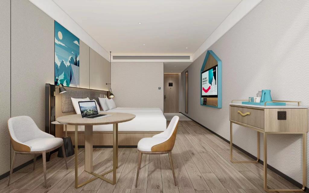 TV a/nebo společenská místnost v ubytování Guangzhou Yilin Hotel - Xiaogang metro Store