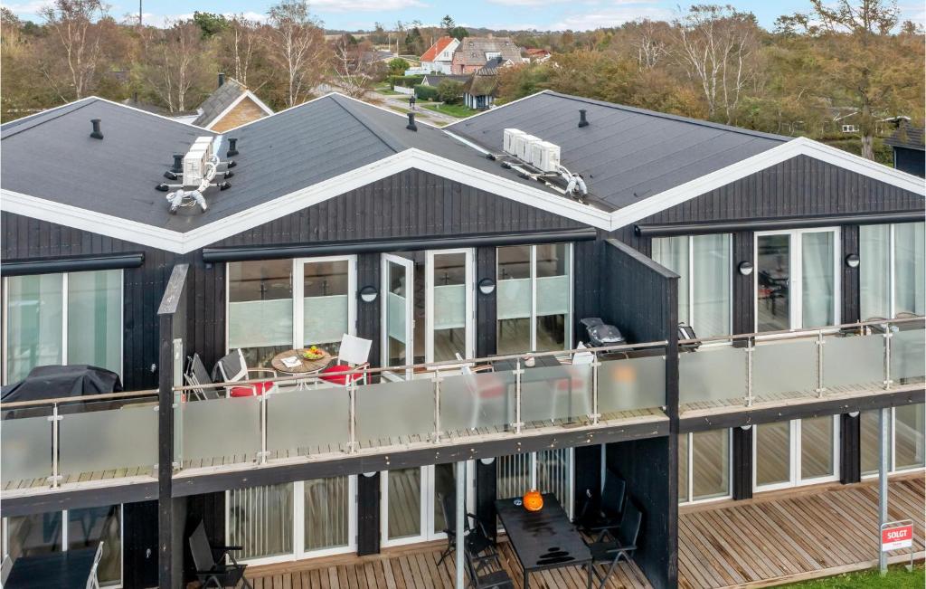 an aerial view of a house with a deck at 2 Bedroom Amazing Apartment In Slagelse in Slagelse
