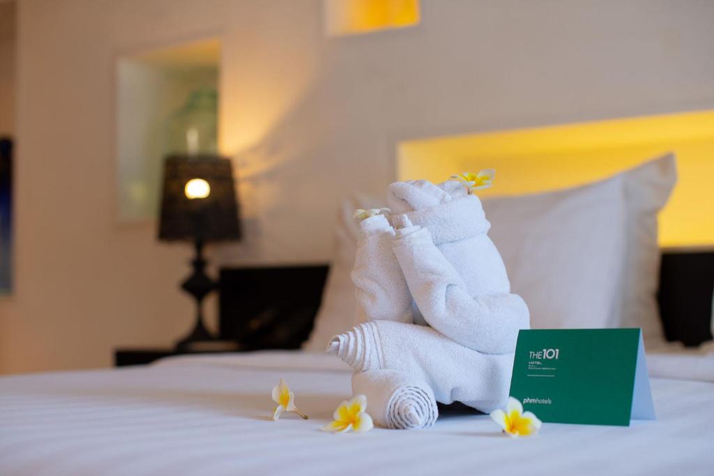 Postel nebo postele na pokoji v ubytování THE 1O1 Bali Fontana Seminyak