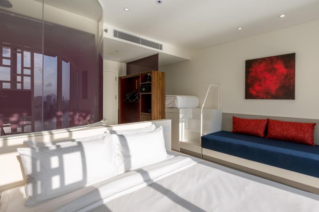 Posezení v ubytování Wink Icon Hotel Danang Riverside - Luxury Suites - 24hrs Stay & Rooftop Pool Bar