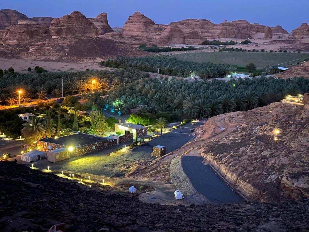 an aerial view of a desert at night at Naseem Country House in Al-ʿUla
