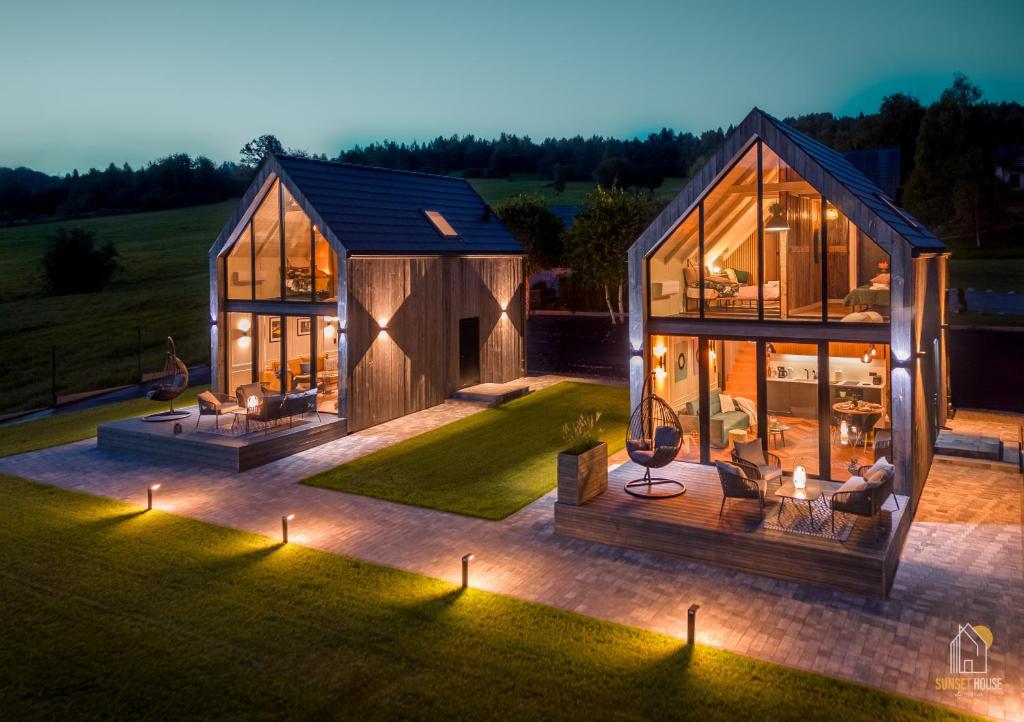 an overhead view of a house with lights in the yard at Sunset House & Spa in Ustrzyki Dolne