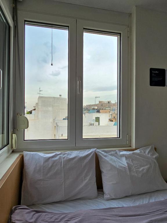 Posteľ alebo postele v izbe v ubytovaní Acropolis view Penthouse by WeHost Athens