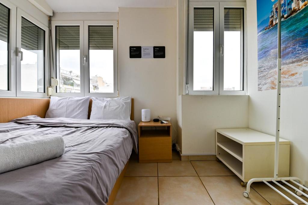 Posteľ alebo postele v izbe v ubytovaní Acropolis view Penthouse by WeHost Athens