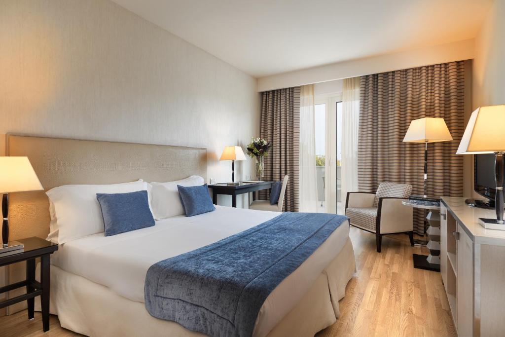 Postel nebo postele na pokoji v ubytování Hotel Nazionale