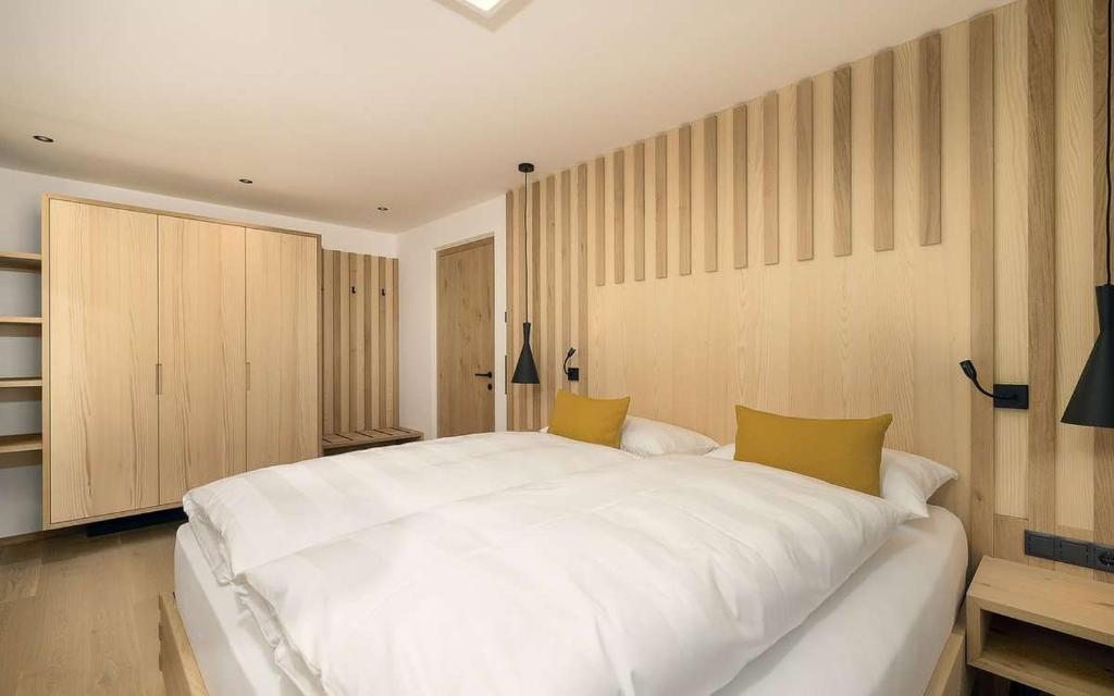 Postel nebo postele na pokoji v ubytování Tschitthof Wohnung Andl
