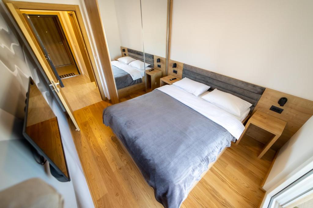 Postel nebo postele na pokoji v ubytování Apart Kraft
