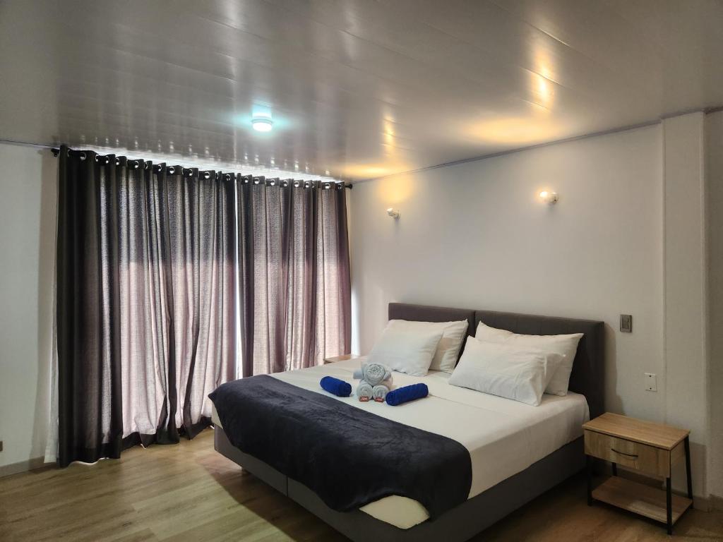 Ένα ή περισσότερα κρεβάτια σε δωμάτιο στο Hotel nelumbo