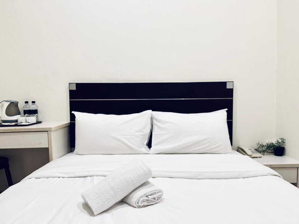 Postel nebo postele na pokoji v ubytování Asphodel Inn
