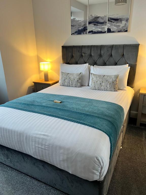 Postel nebo postele na pokoji v ubytování Killorn Guest House