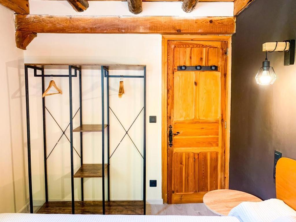 Postel nebo postele na pokoji v ubytování Magic Borda Puntal HUT 7983