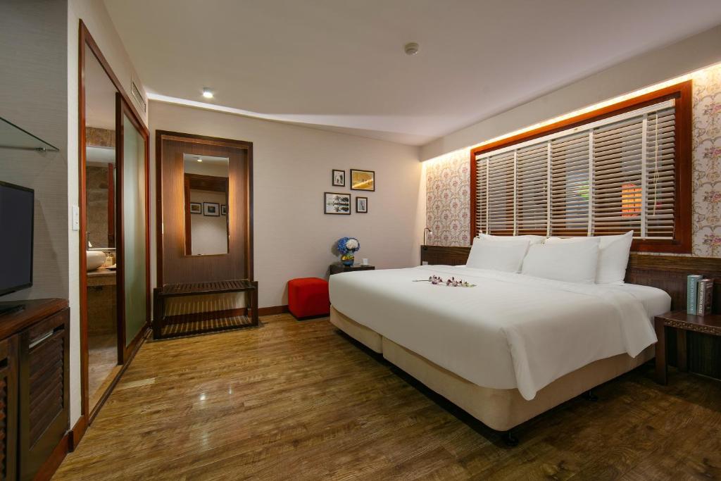 Postel nebo postele na pokoji v ubytování Oriental Suites Hotel & Spa
