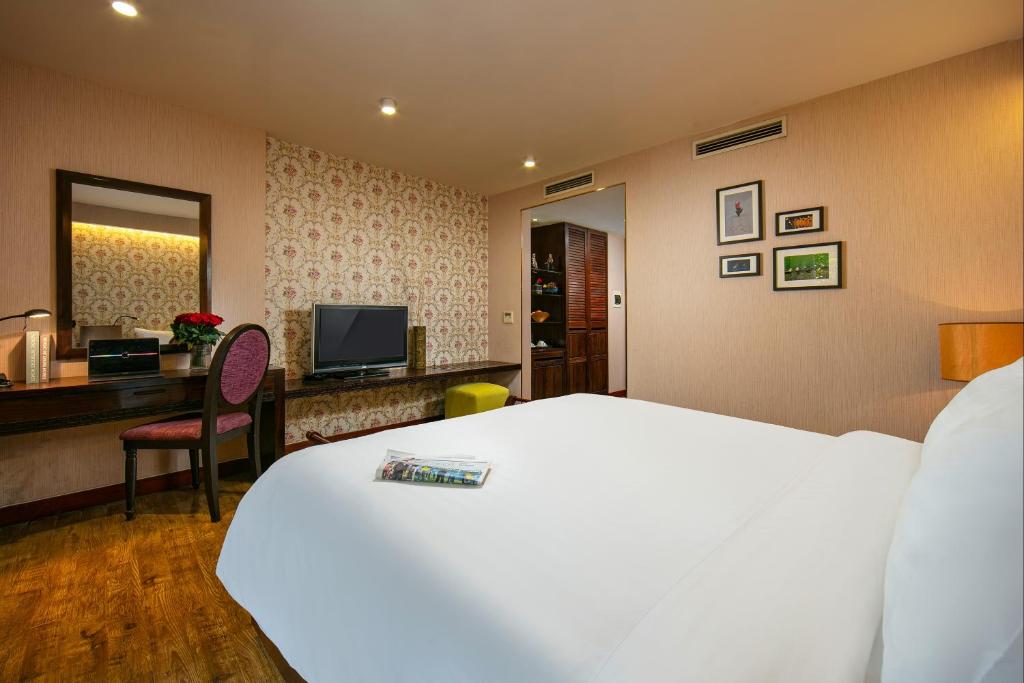 Postel nebo postele na pokoji v ubytování Oriental Suites Hotel & Spa