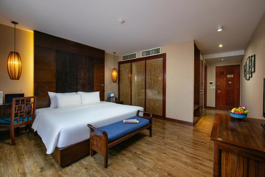 Postel nebo postele na pokoji v ubytování Oriental Suites Hotel & Spa