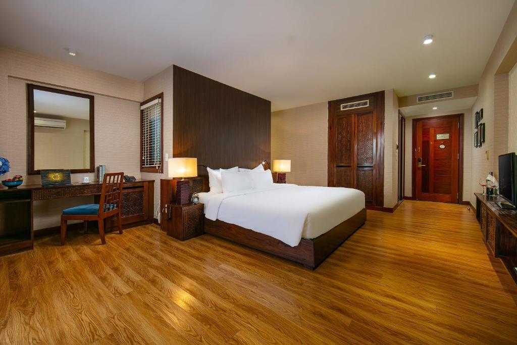 Postel nebo postele na pokoji v ubytování Oriental Suites Hotel & Spa