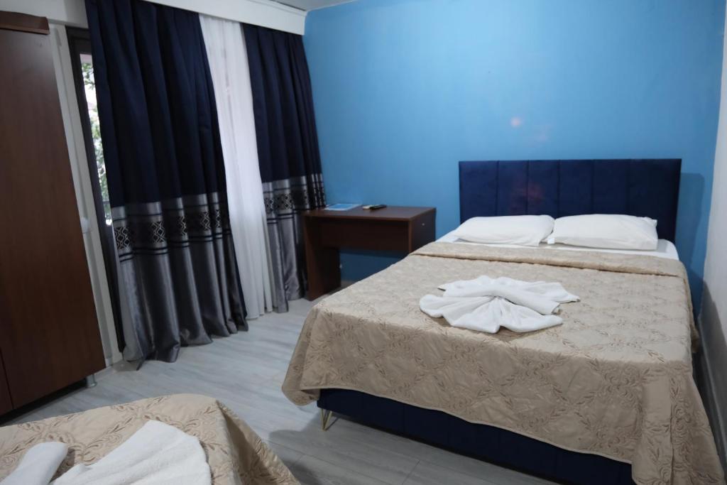 Postel nebo postele na pokoji v ubytování Artemis Yörük Hotel - Pamukkale Denizli