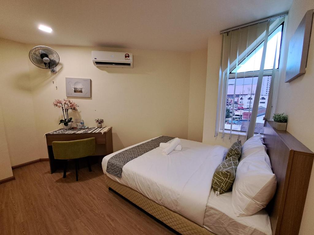 Postel nebo postele na pokoji v ubytování SCC HOTEL PJ