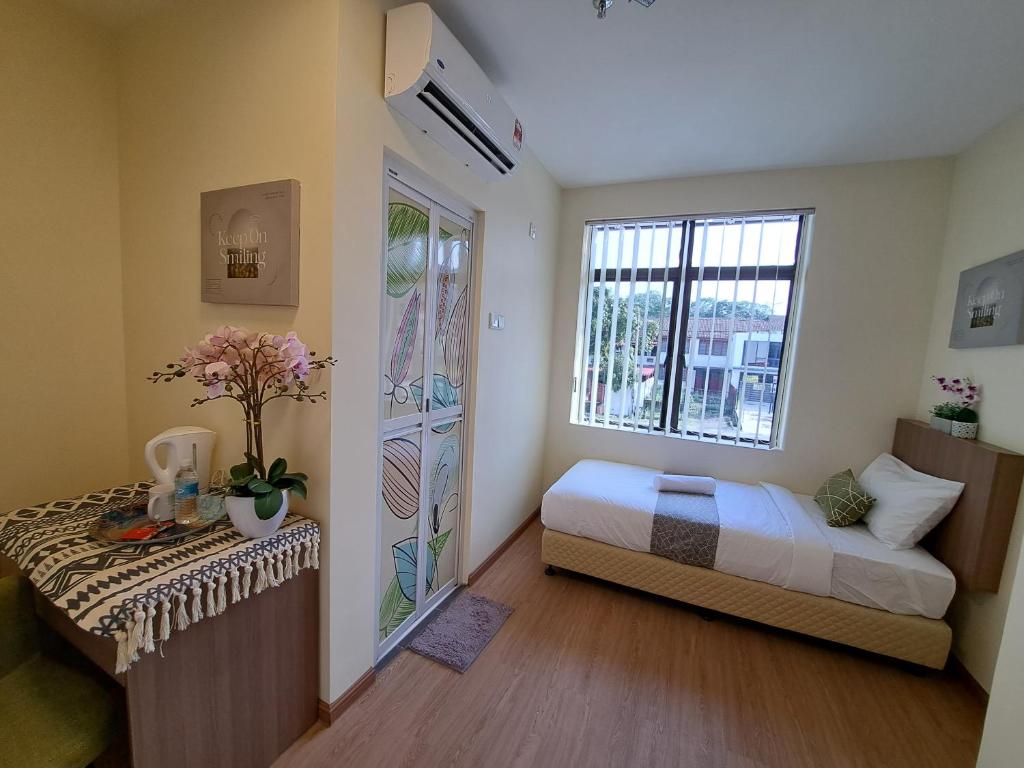 Postel nebo postele na pokoji v ubytování SCC HOTEL PJ