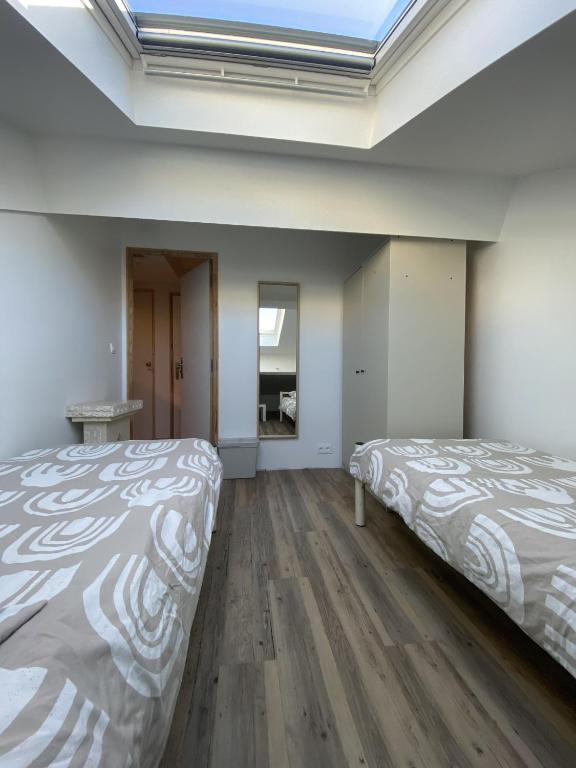 Postel nebo postele na pokoji v ubytování Bohobos Hostel