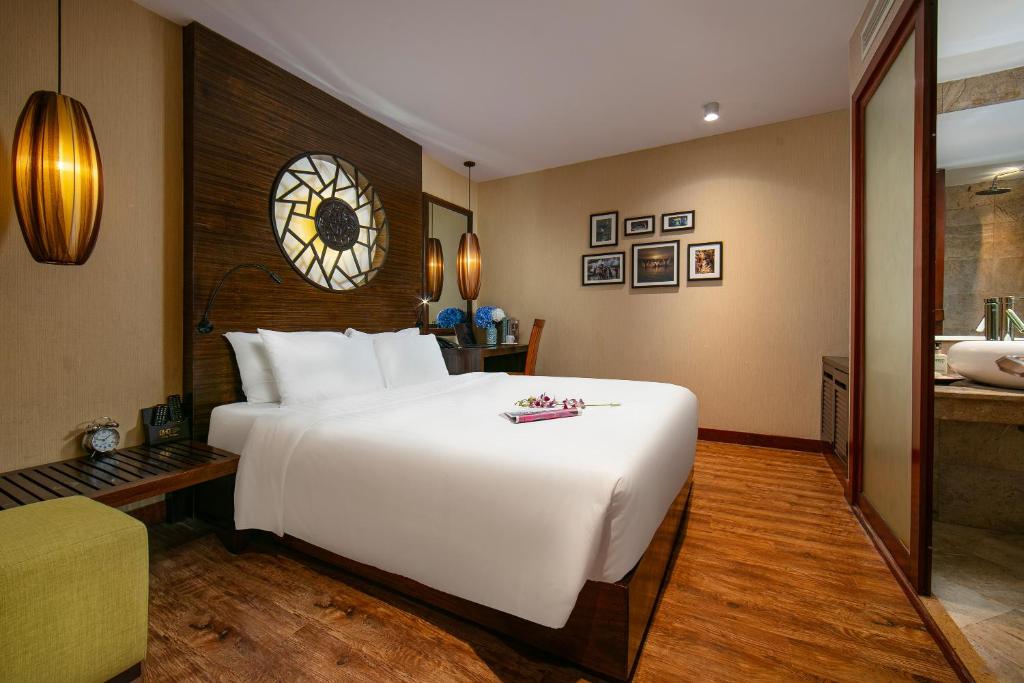 Postel nebo postele na pokoji v ubytování Oriental Suites Hotel & Spa