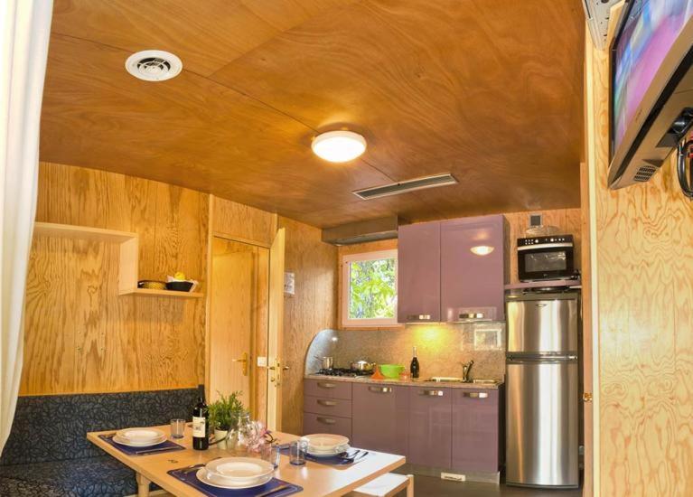 Kuchyň nebo kuchyňský kout v ubytování Il Tridente Camping Village
