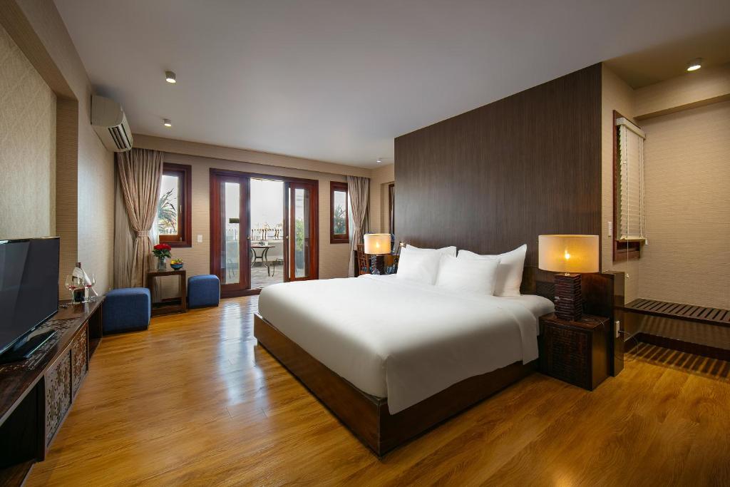 Postel nebo postele na pokoji v ubytování Oriental Suites Hotel & Spa