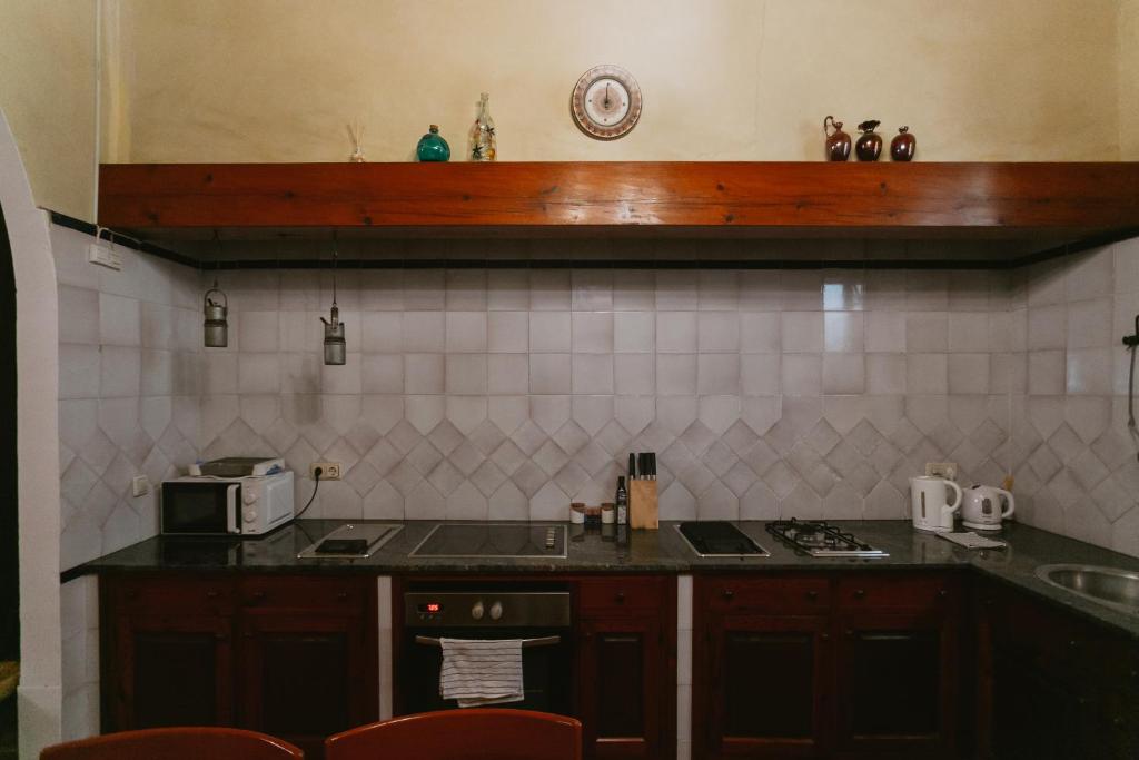 Kuchyň nebo kuchyňský kout v ubytování Komodo Casa Maravillas Rooms