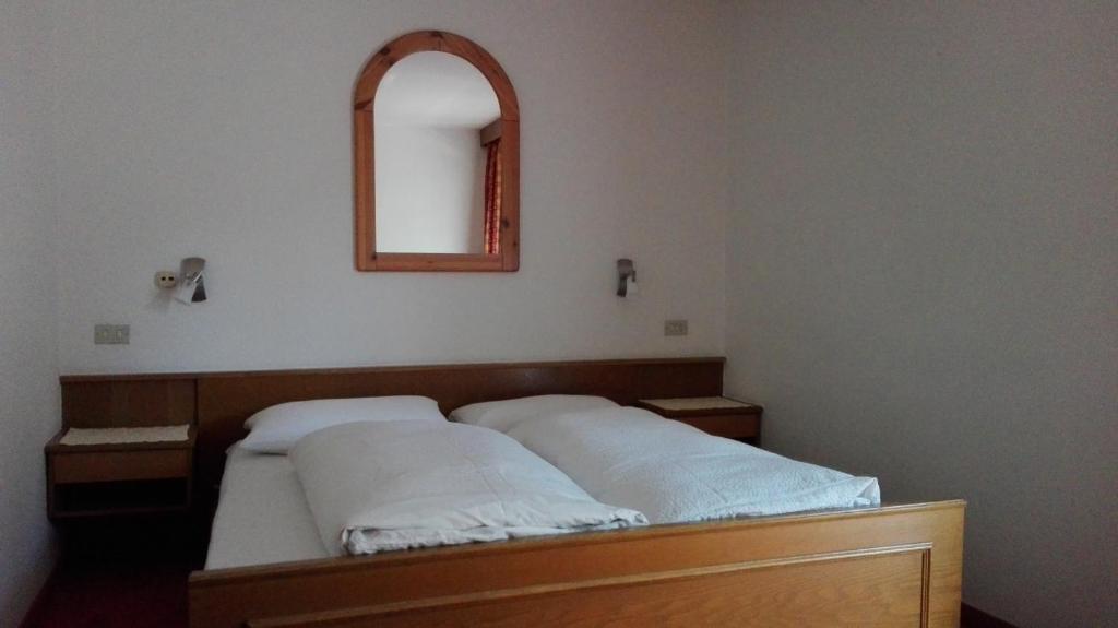 Postel nebo postele na pokoji v ubytování Garnì La Grambla