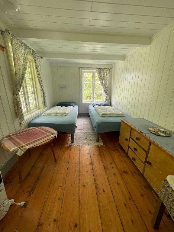 Postel nebo postele na pokoji v ubytování Lofoten Budget Hostel