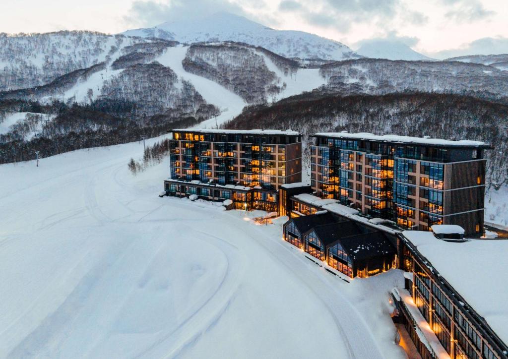 an aerial view of a hotel in the snow at Park Hyatt Niseko Hanazono in Kutchan