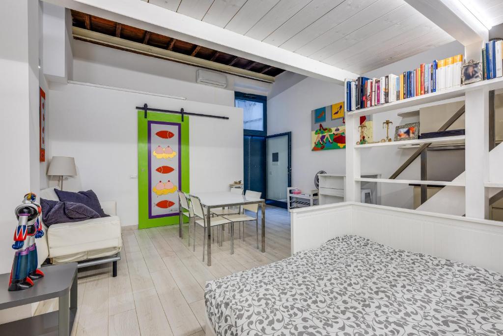 A bed or beds in a room at Rome Historic Center Cozy LOFT