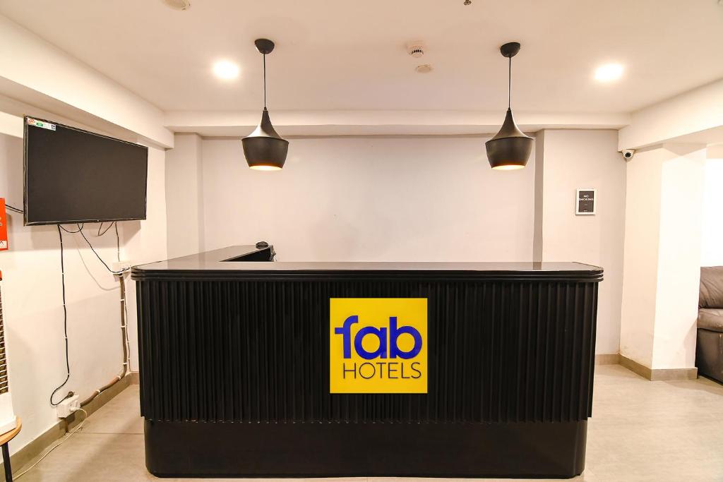 TV a/nebo společenská místnost v ubytování FabHotel Sayeeda International - 600m from Park Circus 7 Point