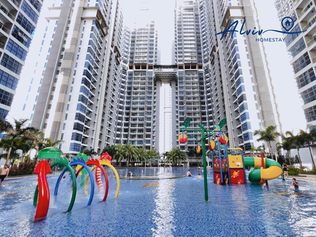 a water park in front of some tall buildings at Atlantis Melaka I 5-11pax I 5min JonkerSt BY Alviv Management in Malacca