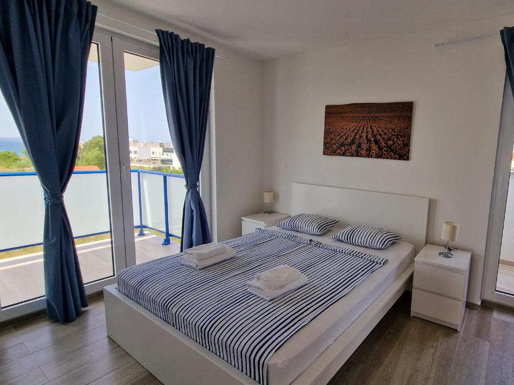Postel nebo postele na pokoji v ubytování Villa Miri III