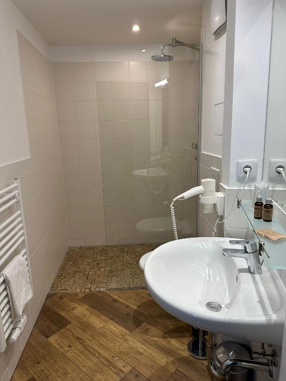 Koupelna v ubytování Versava Apartments