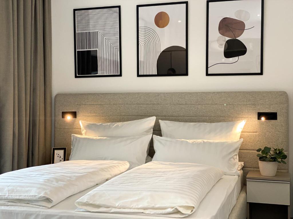 Postel nebo postele na pokoji v ubytování NOVERA Aparthotel