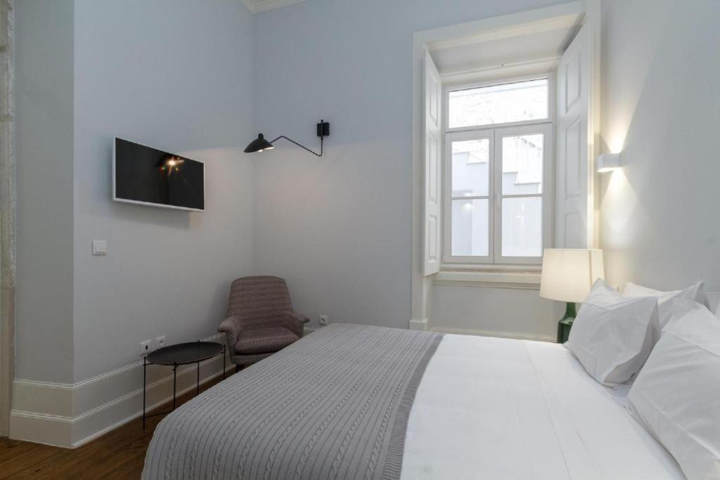 Postel nebo postele na pokoji v ubytování AQ 188 Guest House