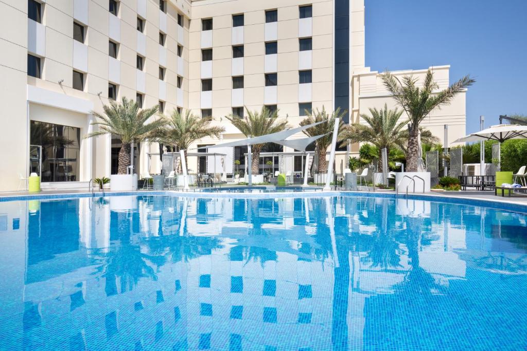 Bazén v ubytování Mercure Sohar nebo v jeho okolí