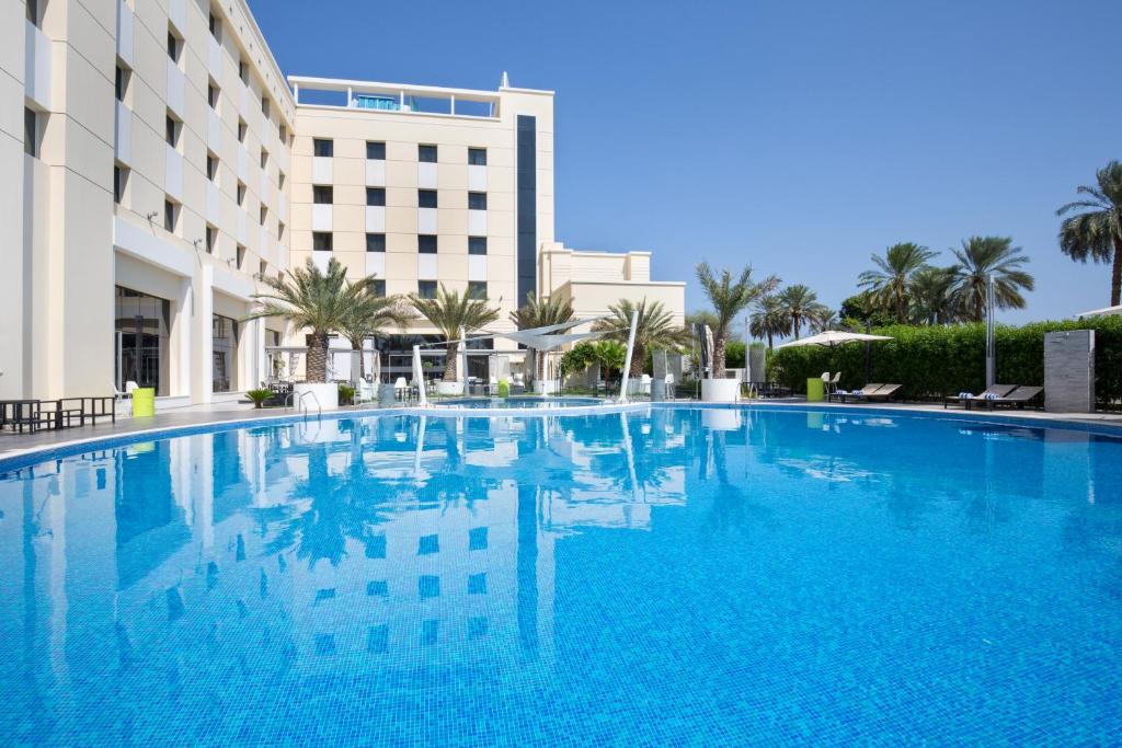 Bazén v ubytování Mercure Sohar nebo v jeho okolí