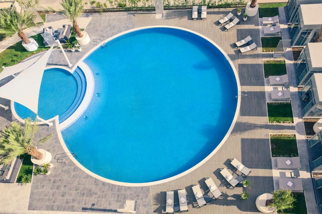 Bazén v ubytování Mercure Sohar nebo v jeho okolí