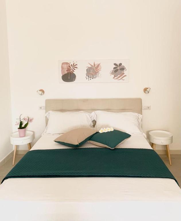 Postel nebo postele na pokoji v ubytování B&B Jolie Suite