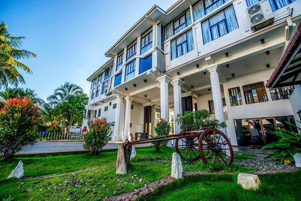 a building with a wagon in front of it at G.M.T.SORABORA VILLAGE HOTEL in Mahiyangana