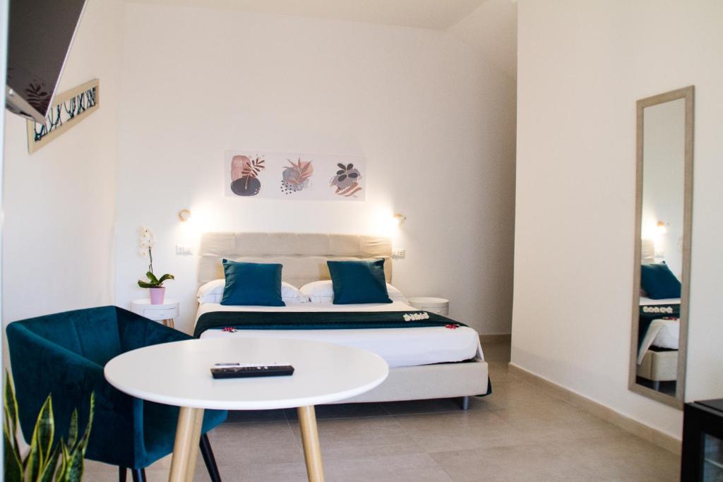 Postel nebo postele na pokoji v ubytování B&B Jolie Suite