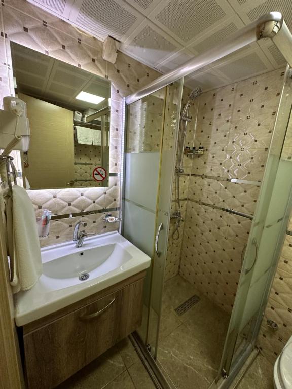 Koupelna v ubytování Line Suite Hotel