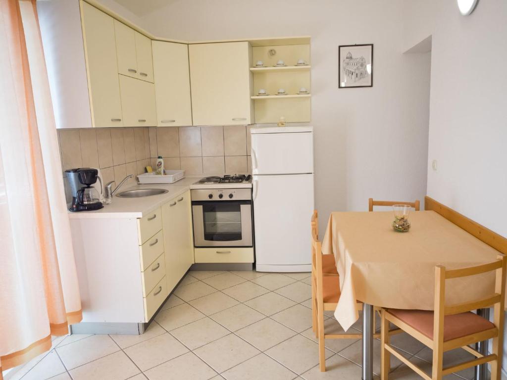 Kuchyň nebo kuchyňský kout v ubytování Apartments Ante-Gojko