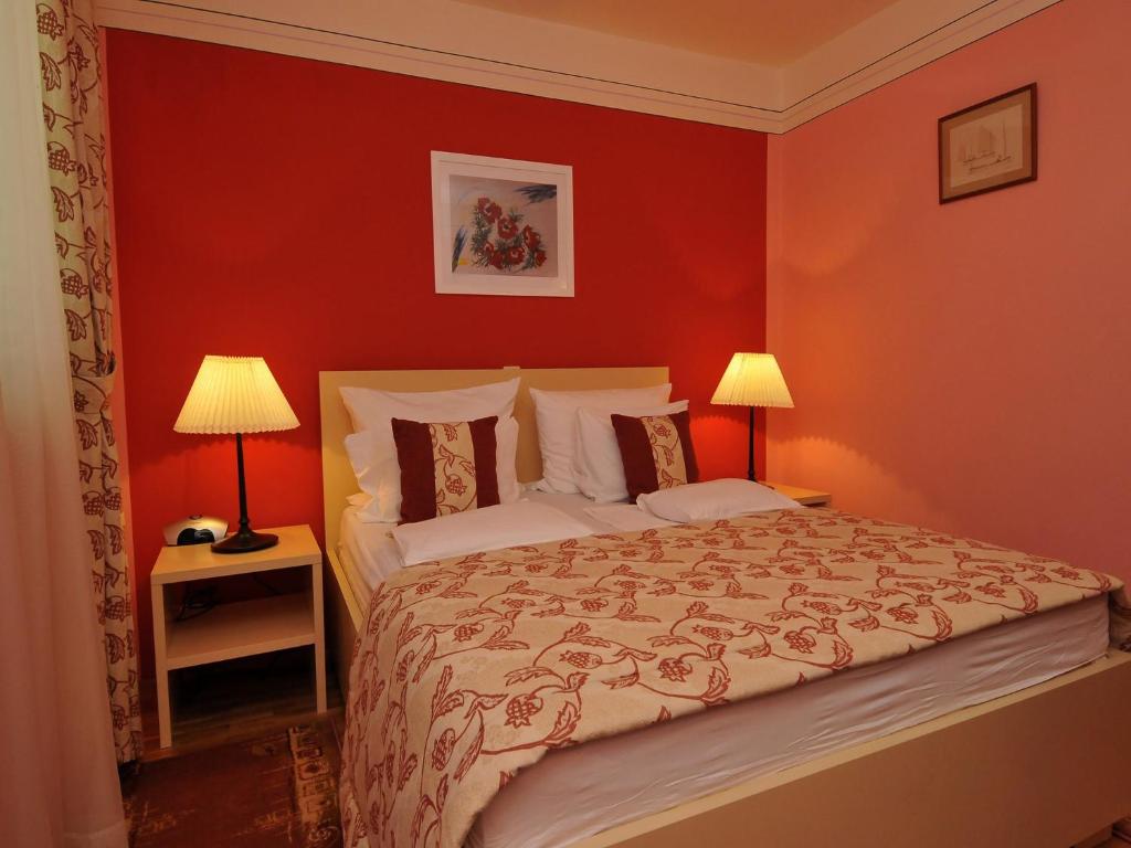 Postel nebo postele na pokoji v ubytování Hotel Haus Am Meer Cavtat